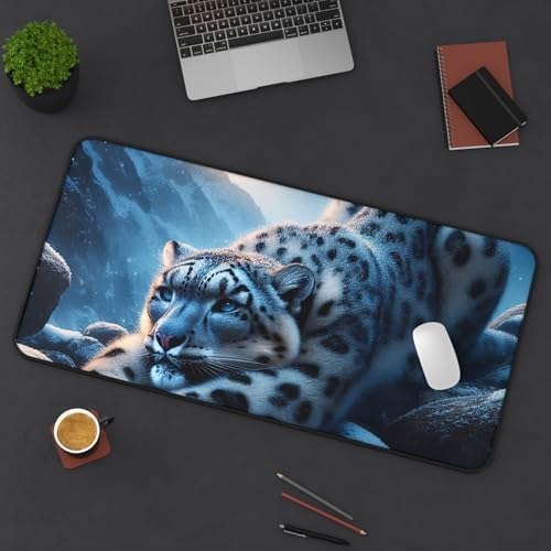 Vibrant Snow Leopard Stretching on Rocks Desk Mat - ICY Blues & Smooth Surface