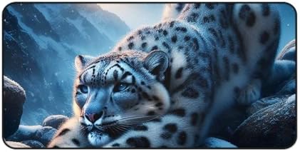 Vibrant Snow Leopard Stretching on Rocks Desk Mat - ICY Blues & Smooth Surface