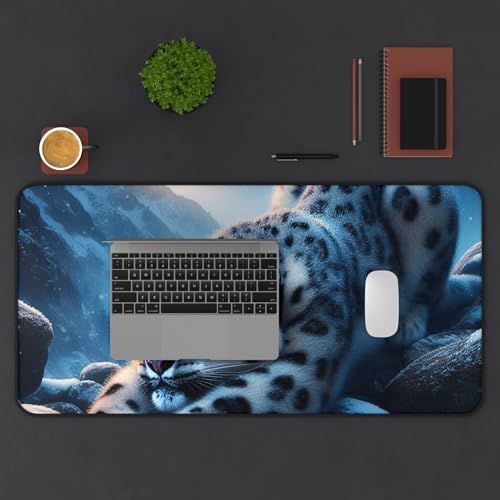 Vibrant Snow Leopard Stretching on Rocks Desk Mat - ICY Blues & Smooth Surface