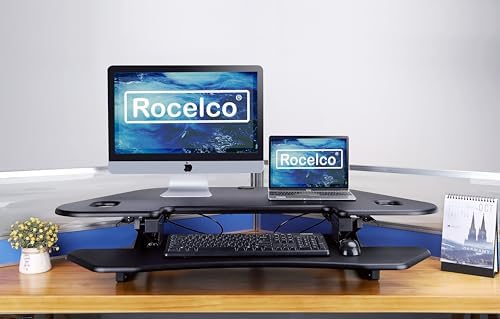 Rocelco 46" Height Adjustable Corner Standing Desk Converter with AC Outlet USB Charger and Anti-Fatigue Floor Mat - Sit Stand Up Tabletop Riser - Keyboard Tray - Black (R CADRB-46-ACUSB-MAFM)
