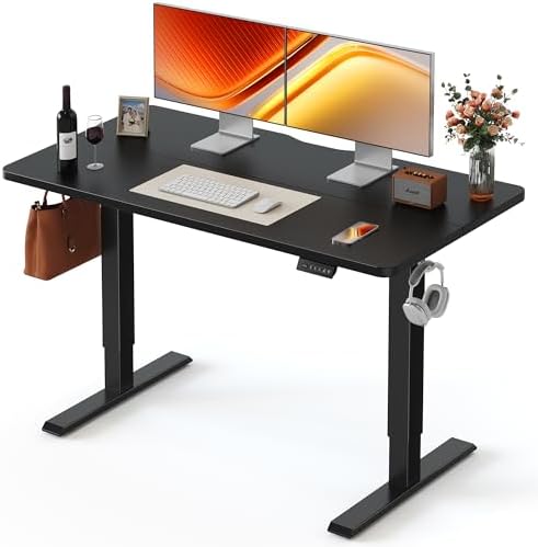 FEZIBO 55 x 24 Inchs Electric Standing Desk, Height Adjustable, Sit Stand Up, Computer Office Desk with Splice Board, Black Frame/Black Top