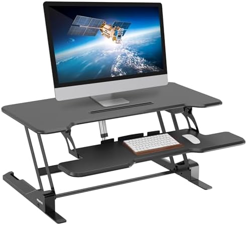 Mount-It! Electric Standing Desk Converter with 38" Tabletop, Height Adjustable Sit Stand Desk Riser, Motorized Desk Riser with Keyboard Tray and Device Slot, Fits Monitor & Laptop, Black