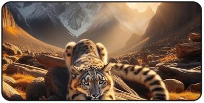Snow Leopard Stretching on Sunlit Golden Rocks Desk Mat - Vibrant Colors Rubber Base Smooth Surface
