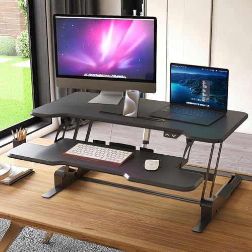 Mount-It! Electric Standing Desk Converter with 38" Tabletop, Height Adjustable Sit Stand Desk Riser, Motorized Desk Riser with Keyboard Tray and Device Slot, Fits Monitor & Laptop, Black