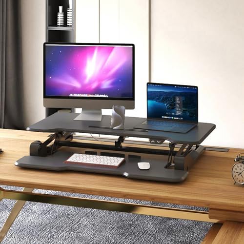 Mount-It! Electric Standing Desk Converter with 38" Tabletop, Height Adjustable Sit Stand Desk Riser, Motorized Desk Riser with Keyboard Tray and Device Slot, Fits Monitor & Laptop, Black