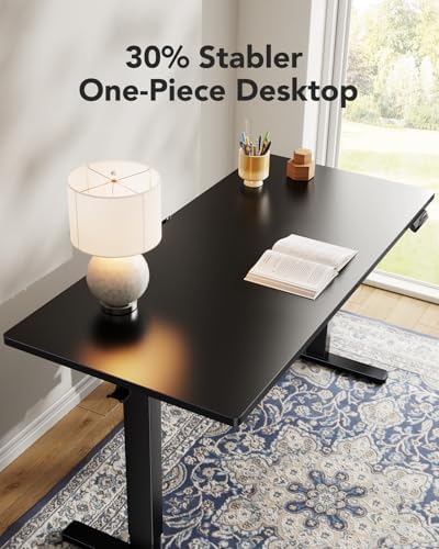 HUANUO Electric Standing Desk, Whole Piece Desktop, Adjustable Height Computer Desk, 4 Height Memory Settings, Sit Stand Up Desk for Home Office, 40" x 24", Black