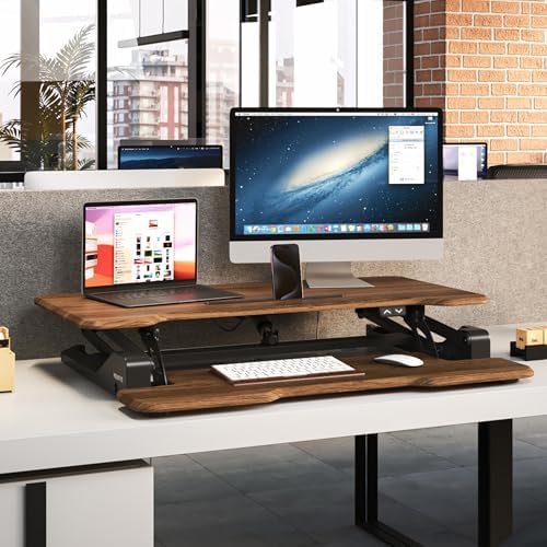 Mount-It! Electric Standing Desk Converter with 38" Tabletop, Height Adjustable Desk Riser, Motorized Desk Riser with Keyboard Tray and Device Slot, Fits Monitor & Laptop, Dark Walnut