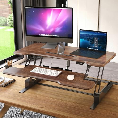 Mount-It! Electric Standing Desk Converter with 38" Tabletop, Height Adjustable Desk Riser, Motorized Desk Riser with Keyboard Tray and Device Slot, Fits Monitor & Laptop, Dark Walnut