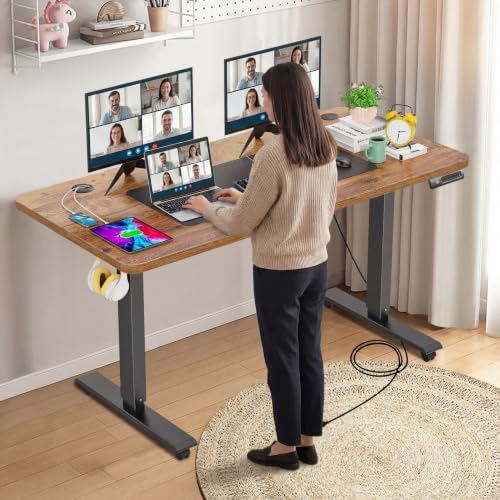 farexon 55 x 24inch Electric Standing Desk Adjustable Height with Power Outlets, Stand up Desk with Wheels,Outlets, Mouse Pad, Preset Heights Home Office Gaming Computer Workstations Table（Brown）